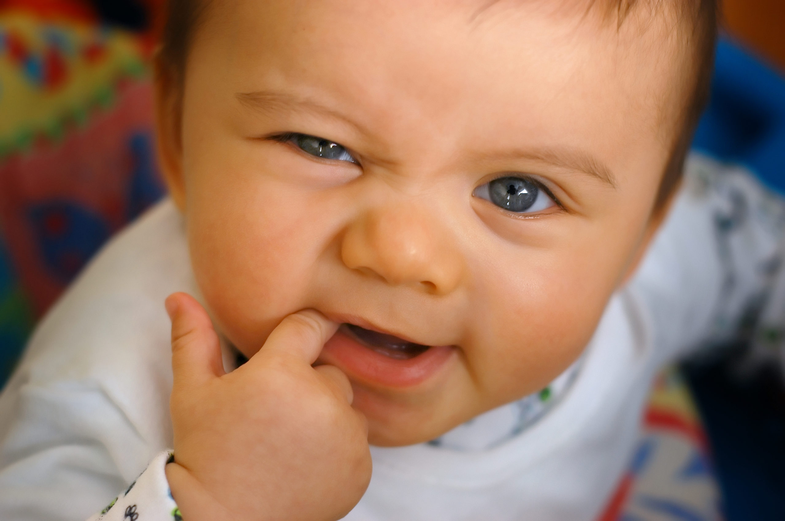 baby biting finger