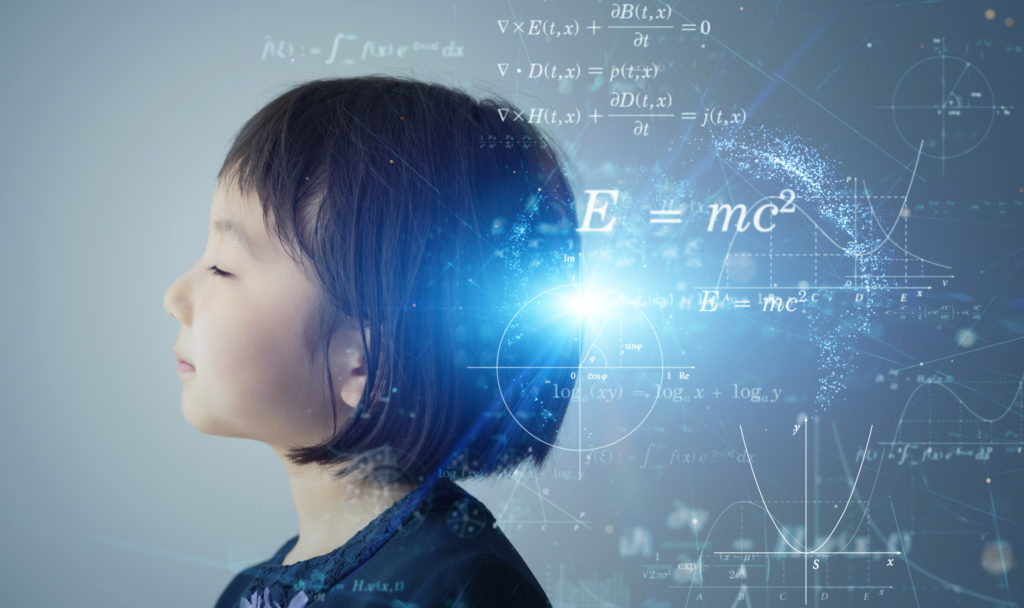 young child surrounded by calculations